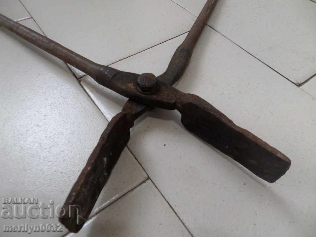 Delivery of Old blacksmith's tongs, wrought iron, tool
