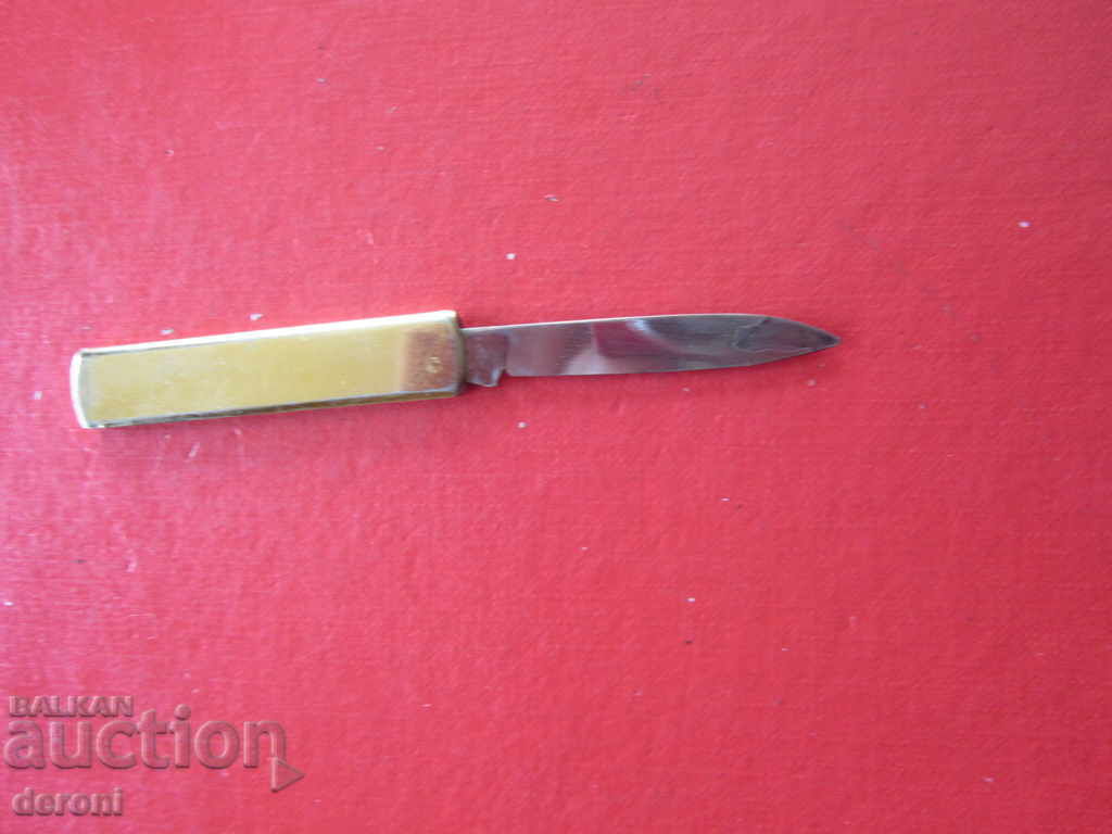 Auction A great gilded knife blade Auction A great gilded knife blade