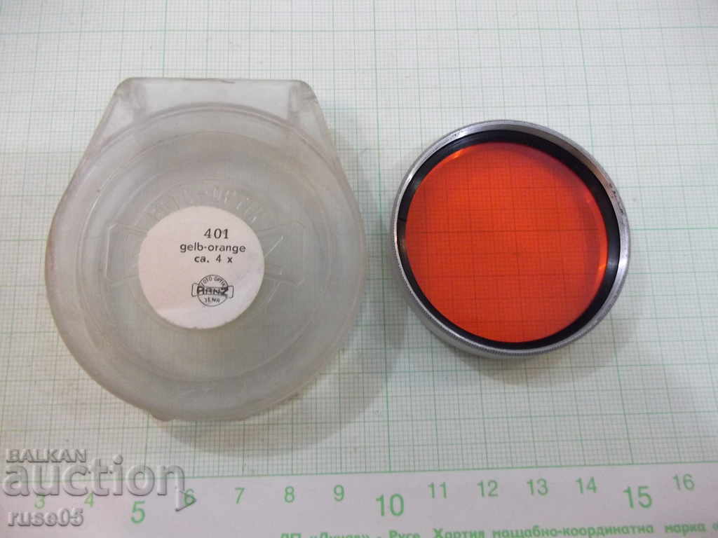 Delivery of Photo filter (gelb-orange ca. 4x / u.- 49 mm.)