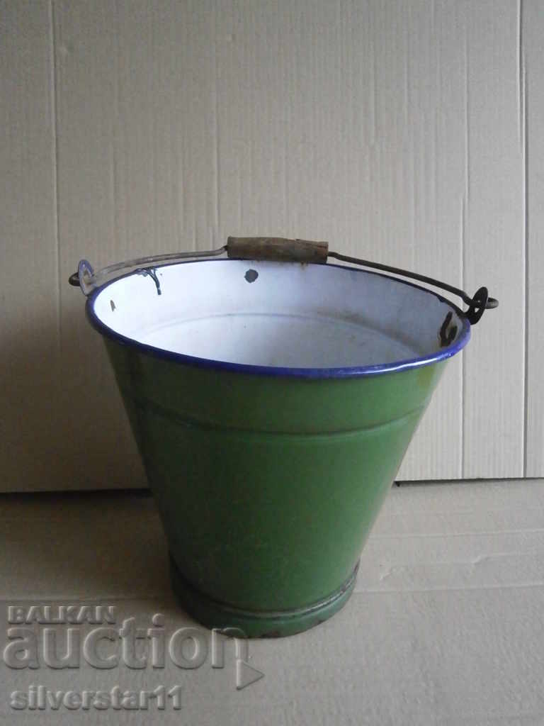Auction  a larger, old enameled bucket