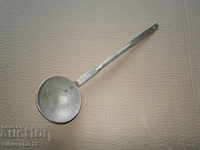 Old spoon of aluminum, labeled early salt, Bulgaria