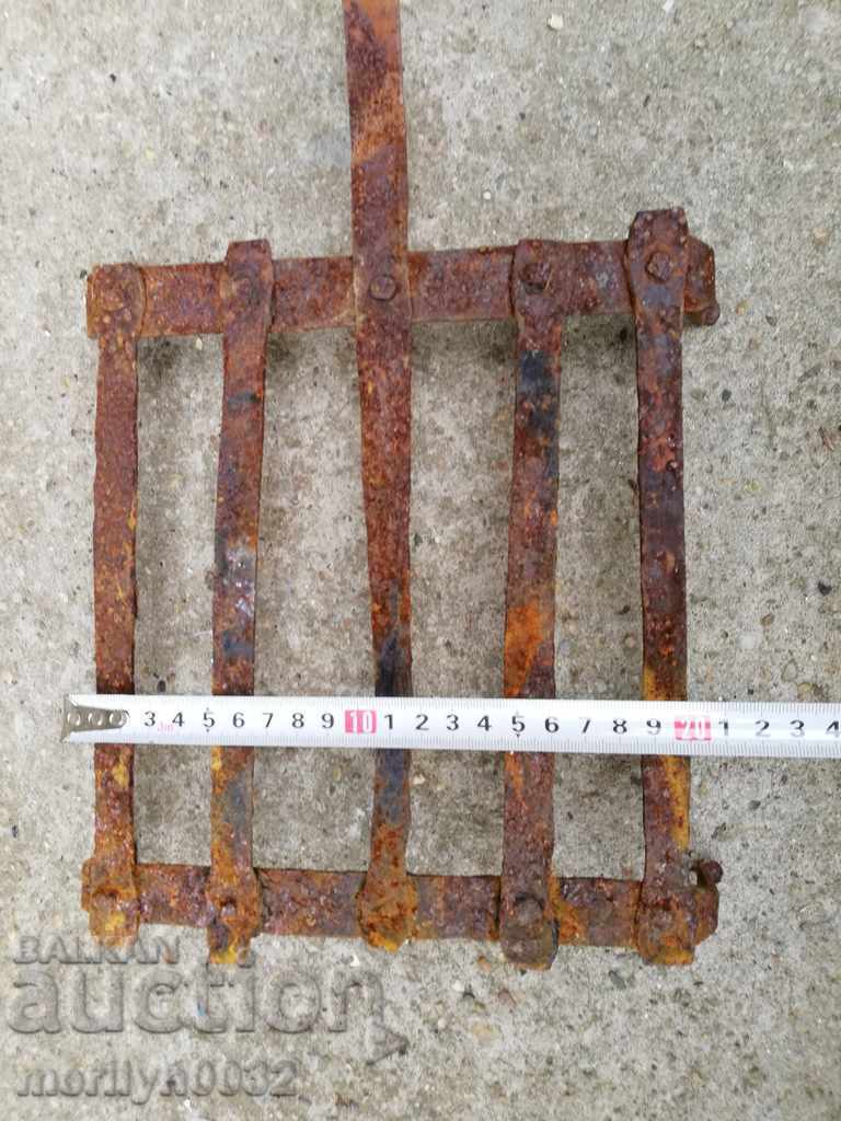 An old hand-forged grill, a steak, wrought iron - 6 An old hand-forged grill, a steak, wrought iron - 6