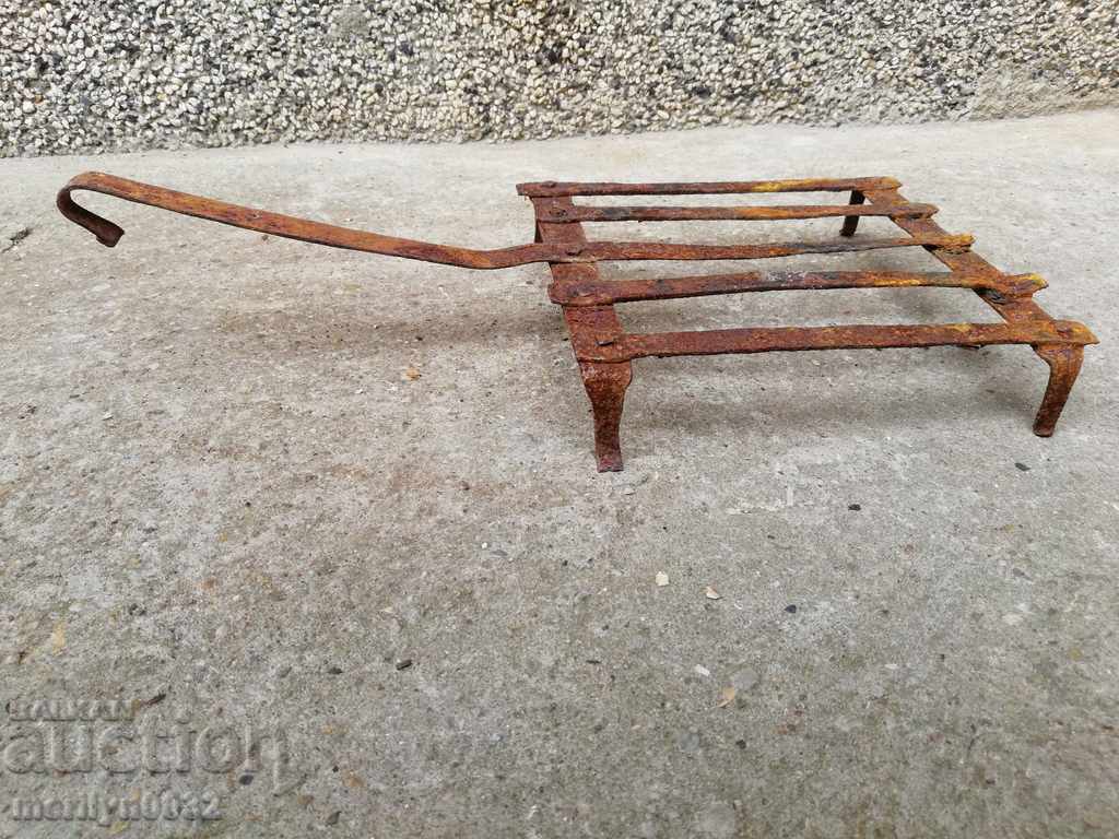 Old hand forged grill, steakhouse, wrought iron