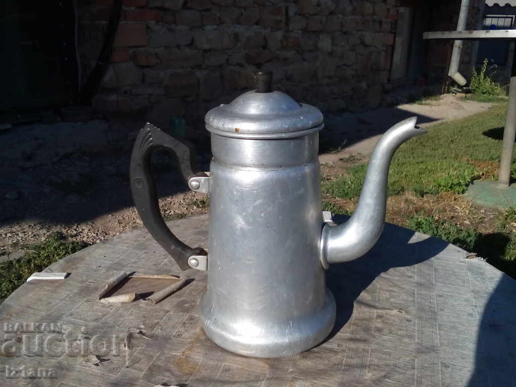 Old aluminum teapot