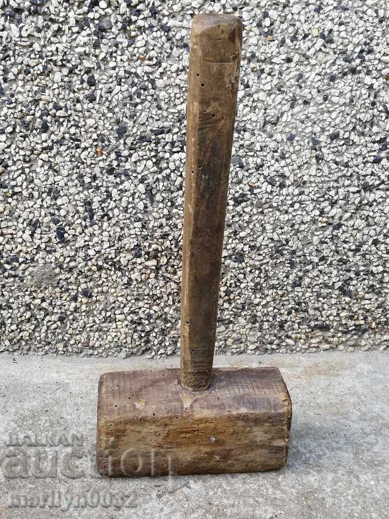 Old wooden wood hammer hammer tool