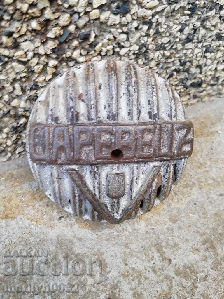 Delivery of Cast iron emblem of an old stove Delivery of Cast iron emblem of an old stove