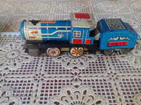 Old train. Lamarine mech. toy.