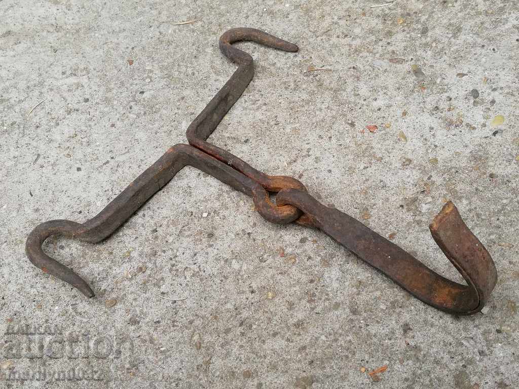 Delivery of An old forged scraping hook, double twin Delivery of An old forged scraping hook, double twin