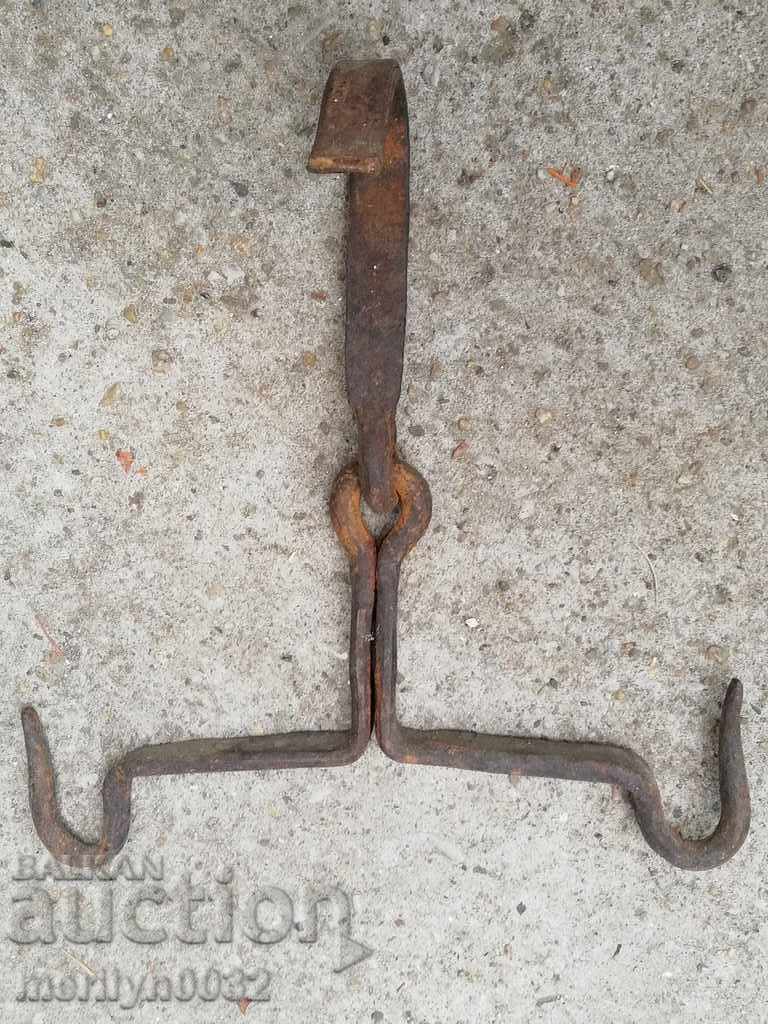 An old forged scraping hook, double twin