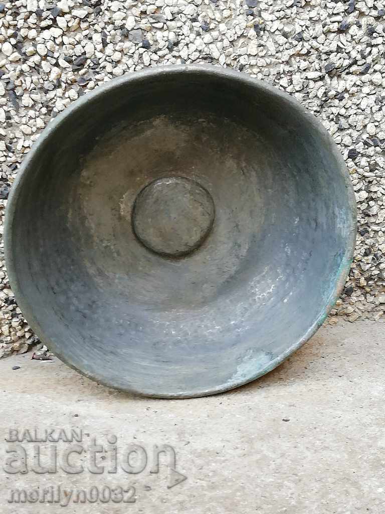 An old copper cup for a bath, a hammam, a baker, a bowl