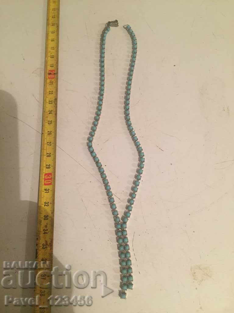 an old necklace with turquoise