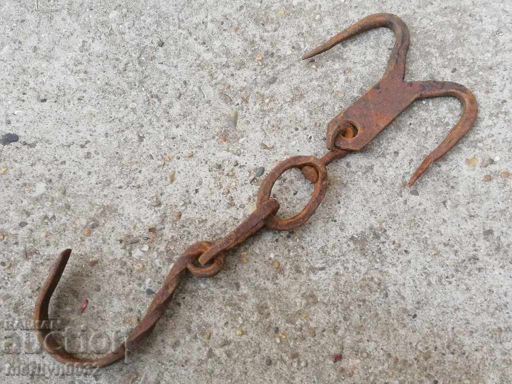 An old forged scraping hook, double twin with price 39.00 BGN | € 19.94
