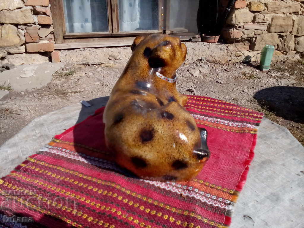 Delivery of An old porcelain figure, a dog