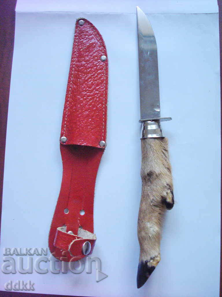 Old knife with animal leg
