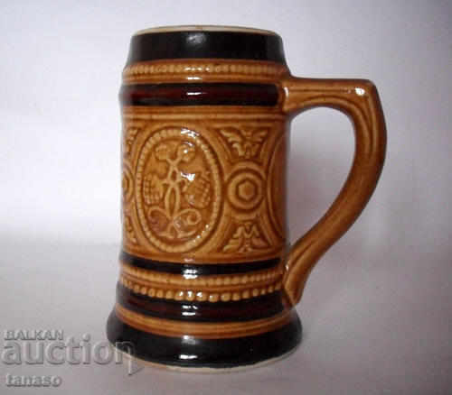 Embossed ceramic old German mug