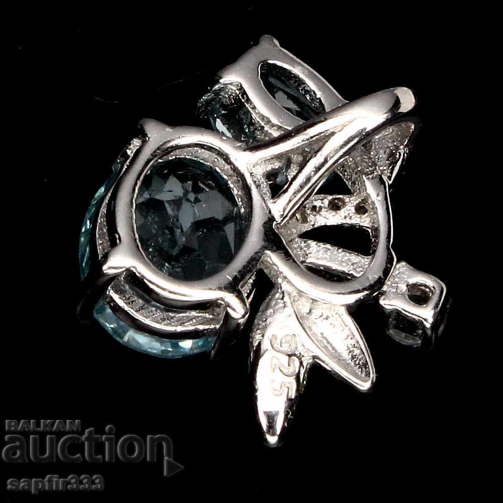 Auction  GENTLE FINE SILVER MEDALLION WITH NATURAL TOPAZ AND ZIRCONIA