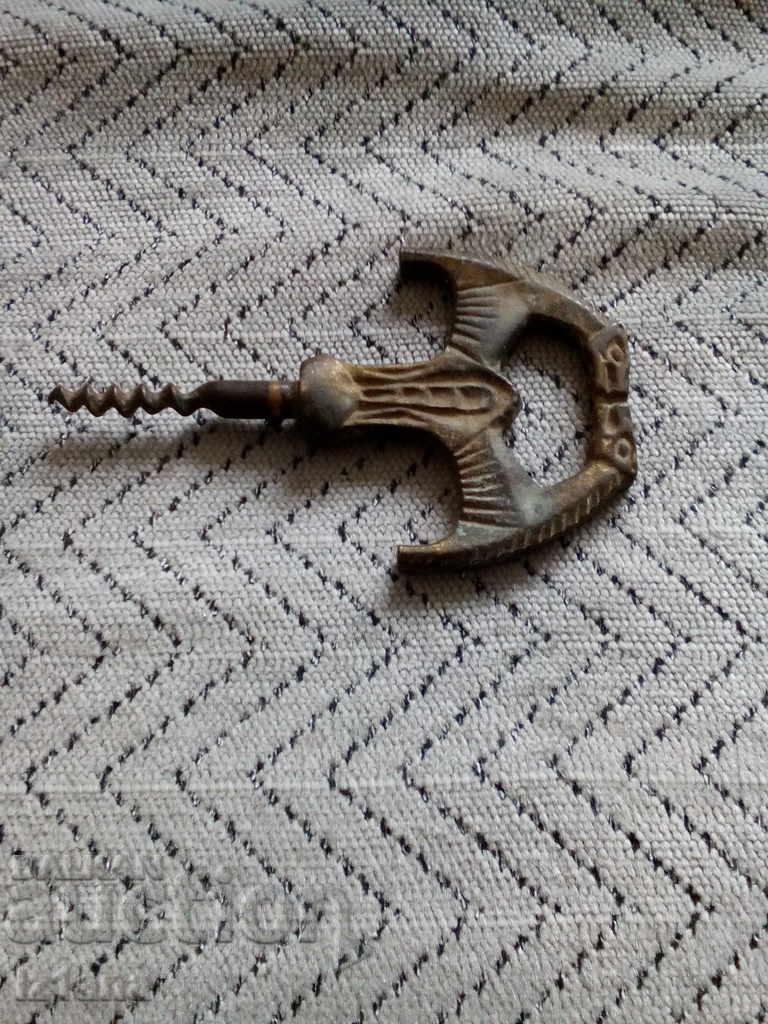 An old bottle opener An old bottle opener