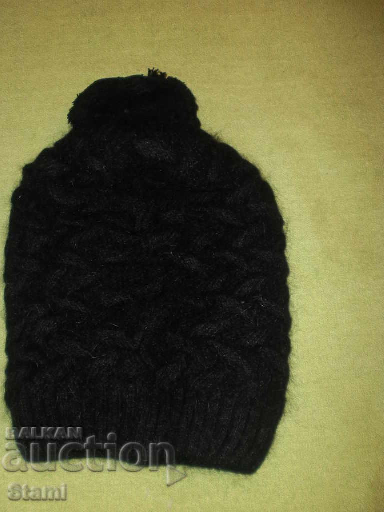 Machine-knit woolen hat, black with price 10.00 BGN | € 5.11