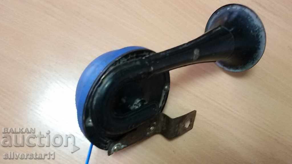 Delivery of horn thunderbolt from a retro car Delivery of horn thunderbolt from a retro car