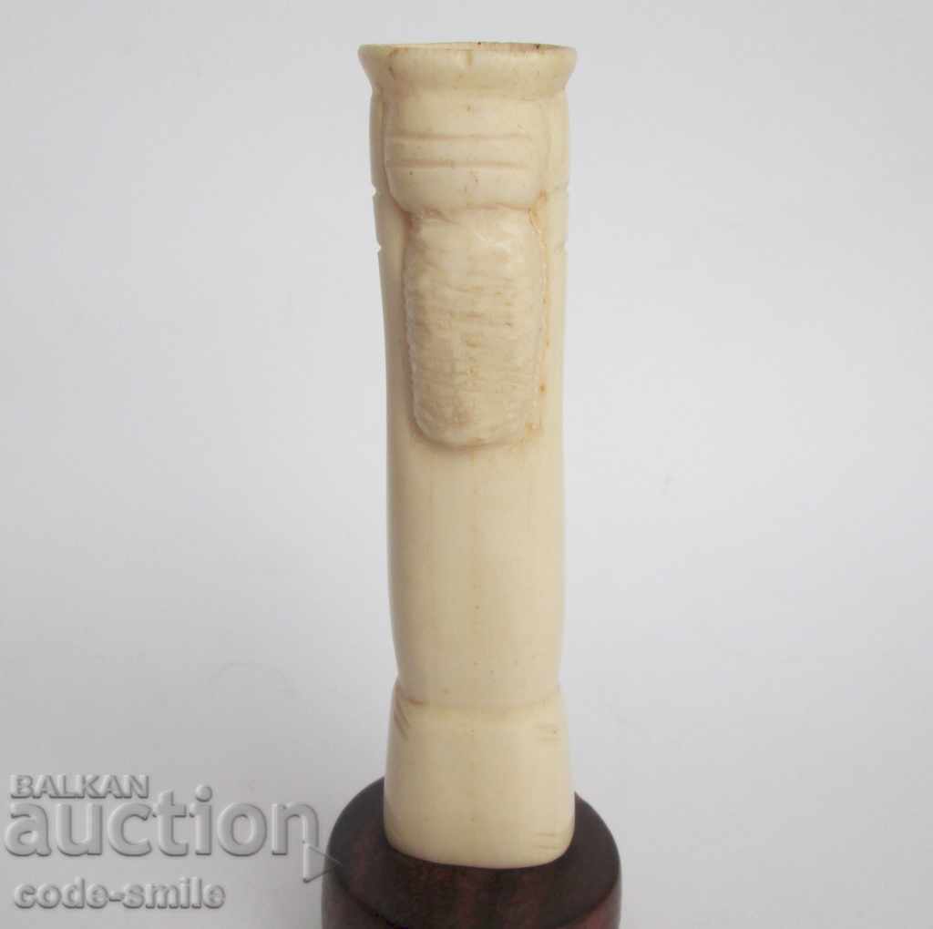 Delivery of Old African figure statuette vase from bone