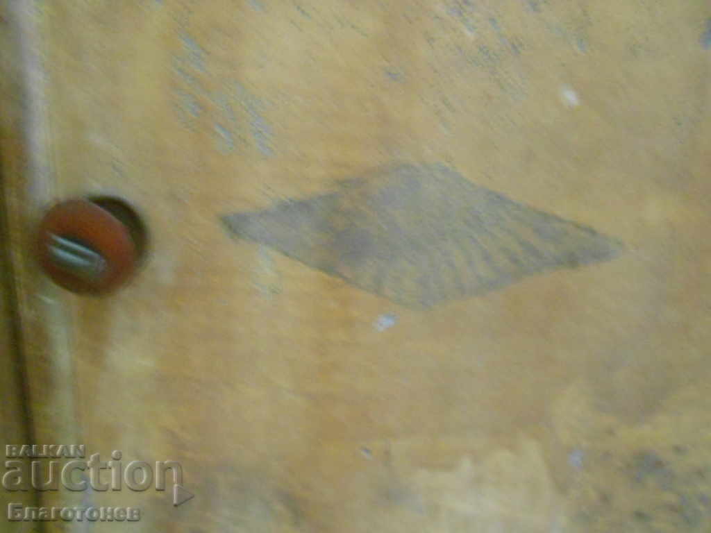 Auction An old metal cabinet Auction An old metal cabinet