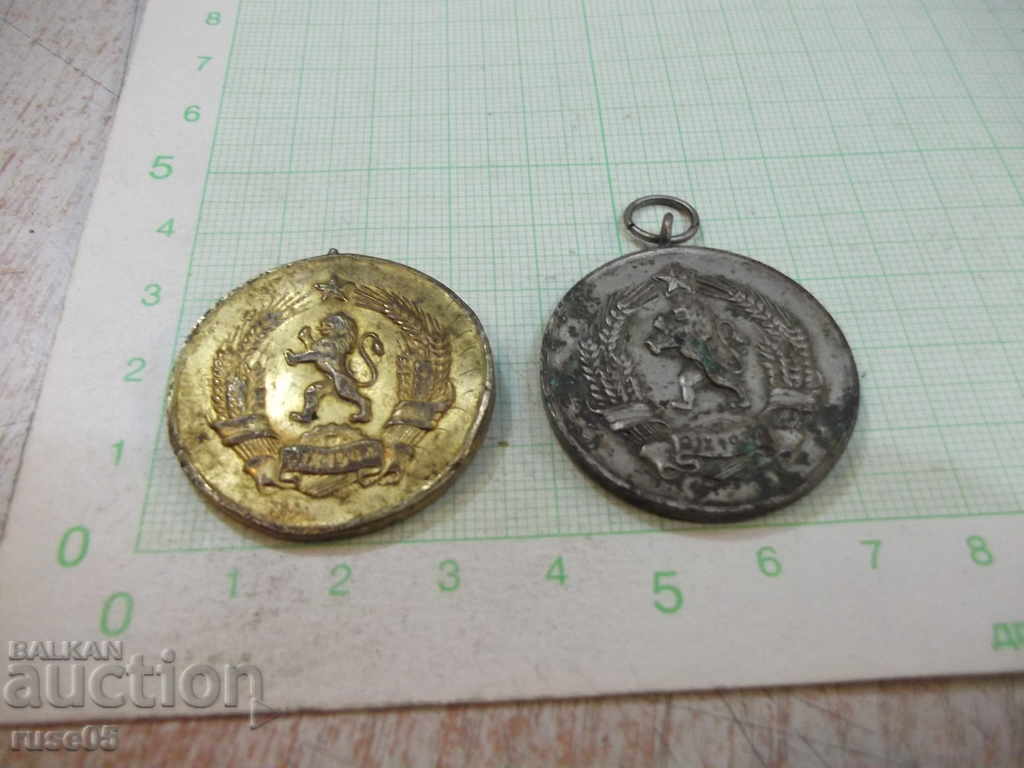 Auction Lot of 2 pcs. Medals for Maternity (grades I and II) Auction Lot of 2 pcs. Medals for Maternity (grades I and II)