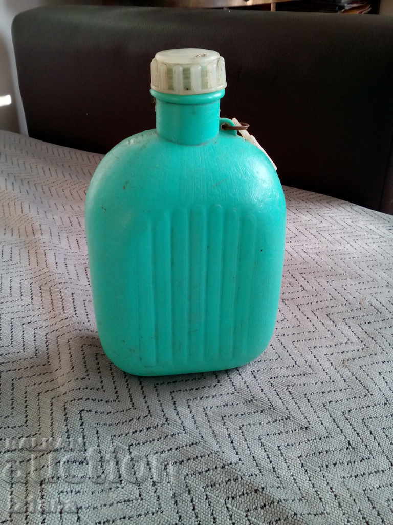 Auction An old plastic flask Auction An old plastic flask