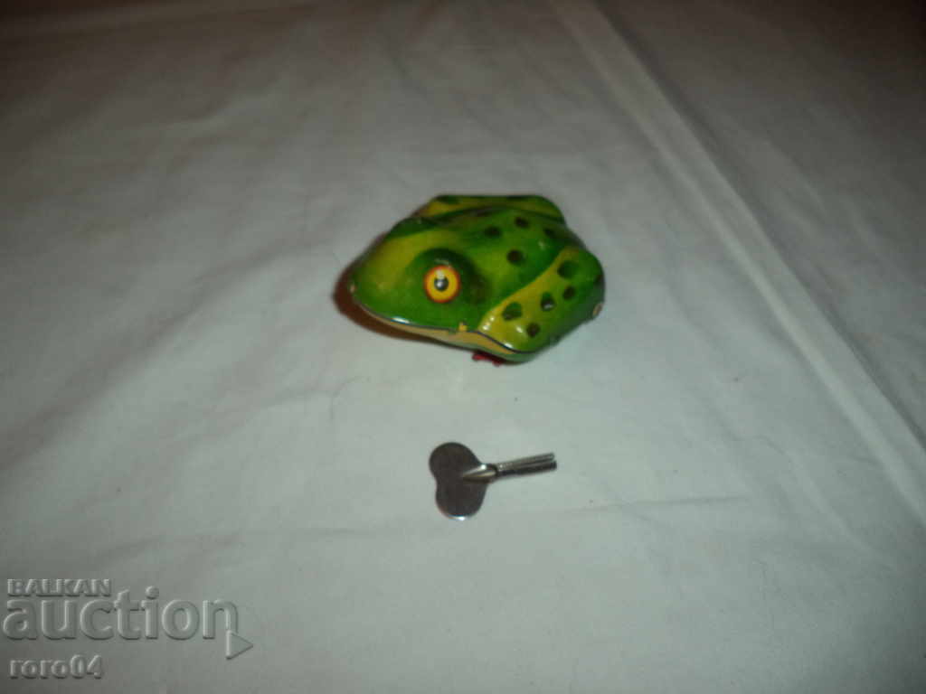 OLD SHEET METAL MECHANICAL FROG WITH KEY with price 31.50 BGN | € 16.11