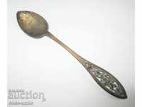 An old Renaissance silver spoon with filigree