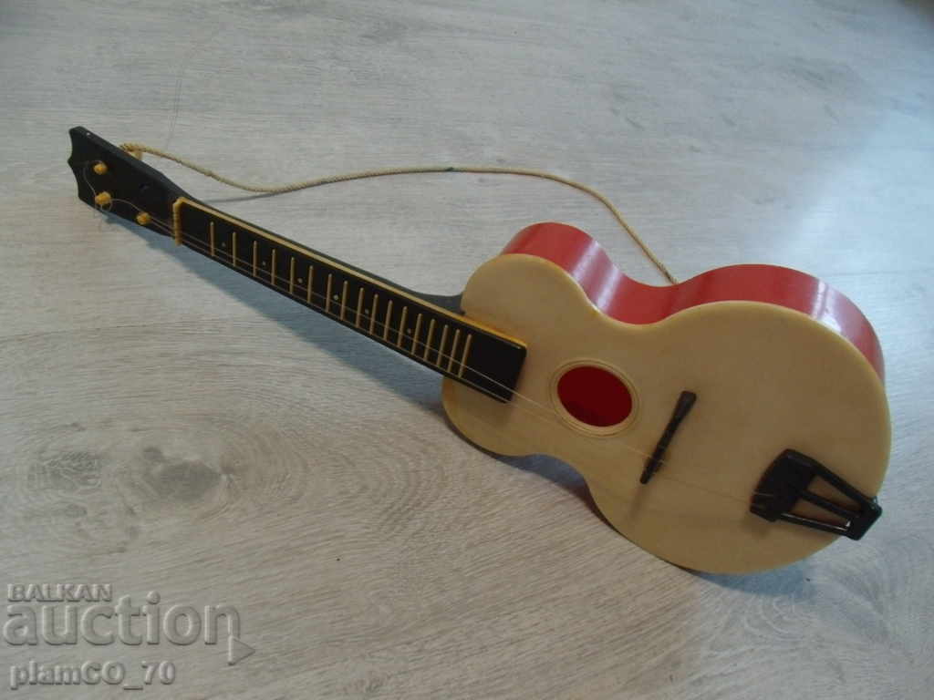 Auction  No * 2451 old toy - guitar - soc. Period