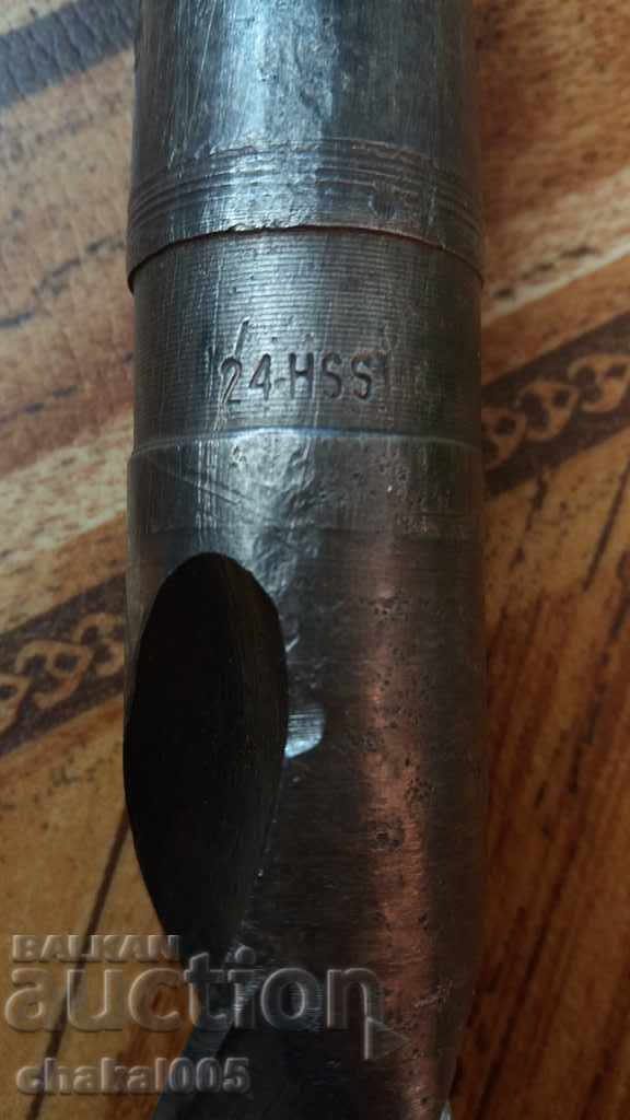 Auction Old iron drill Auction Old iron drill