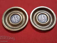 Two royal saucers with a monogram and silver inserts