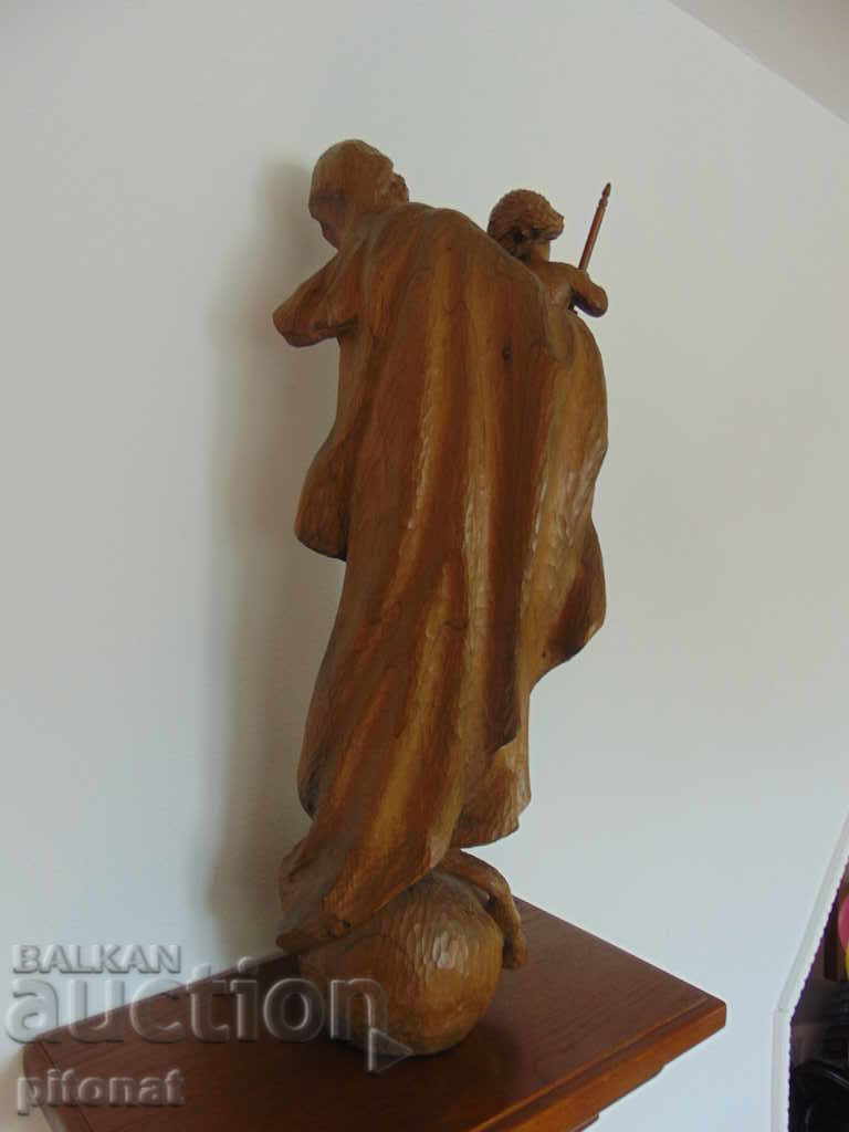 Delivery of A large religious wooden statue Delivery of A large religious wooden statue