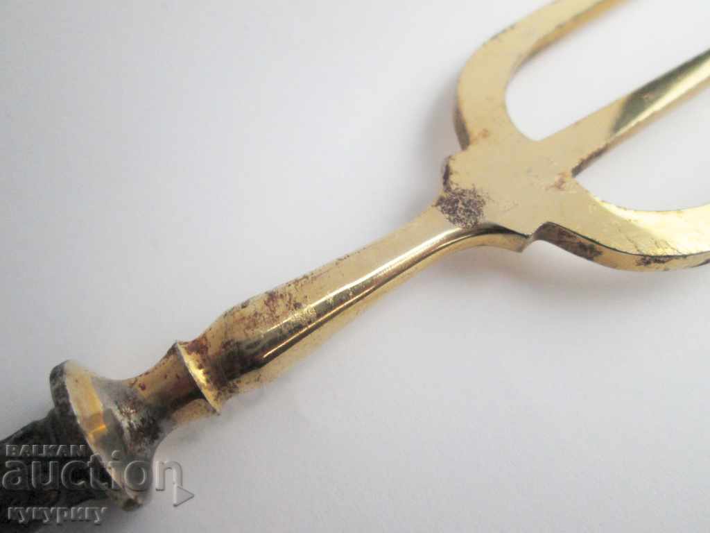 A great old fork for serving a golden silver handle with price 50.00 BGN | € 25.56 A great old fork for serving a golden silver handle with price 50.00 BGN | € 25.56