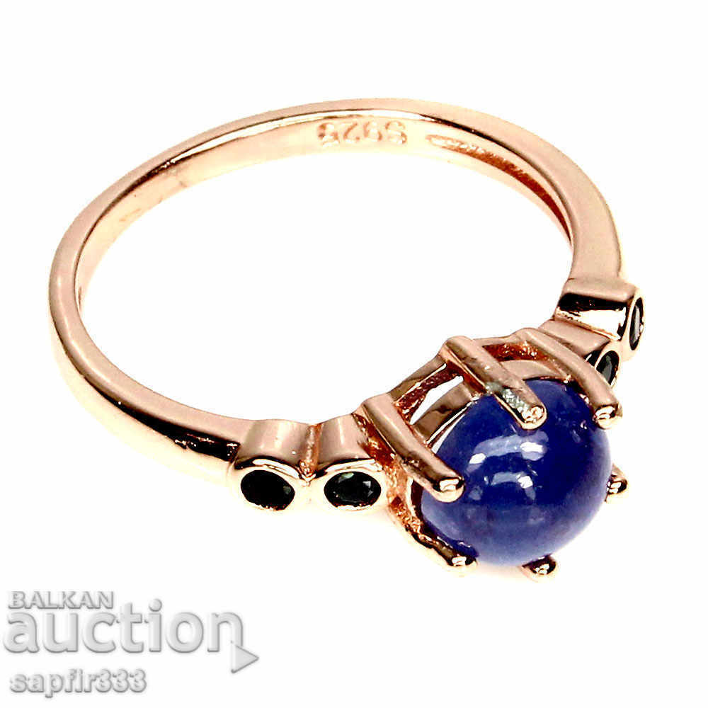 Auction  EXQUISITE RING WITH NATURAL TANZANITE AND BLACK SPINELS