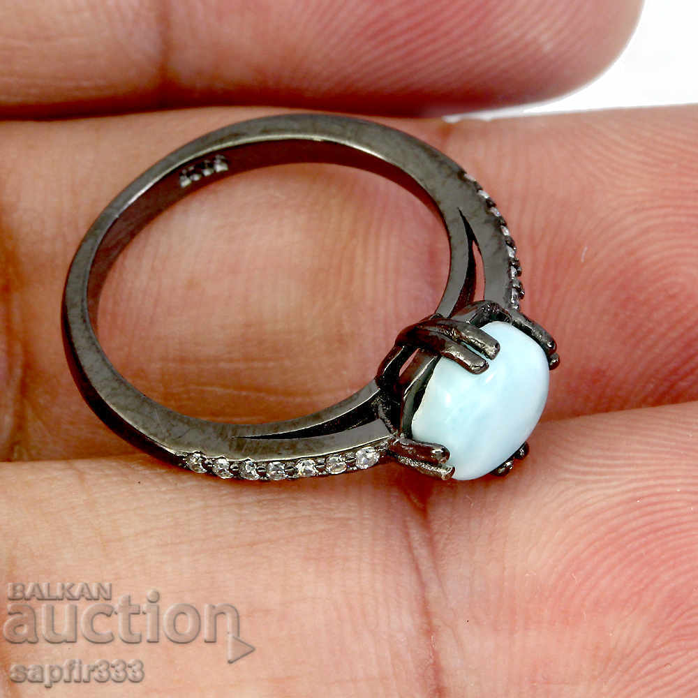 Auction LUXURY RING WITH NATURAL LARIMAR AND CYCLONS Auction LUXURY RING WITH NATURAL LARIMAR AND CYCLONS