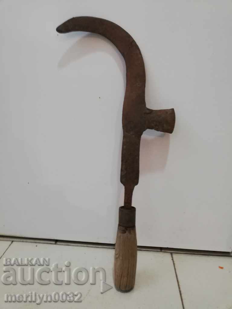 Old hand forged hammer, wrought iron blade