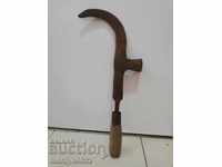 Old hand forged hammer, wrought iron blade