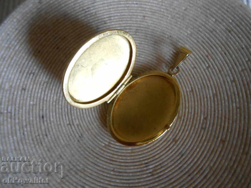 Auction silver medallion opener, gilded Auction silver medallion opener, gilded