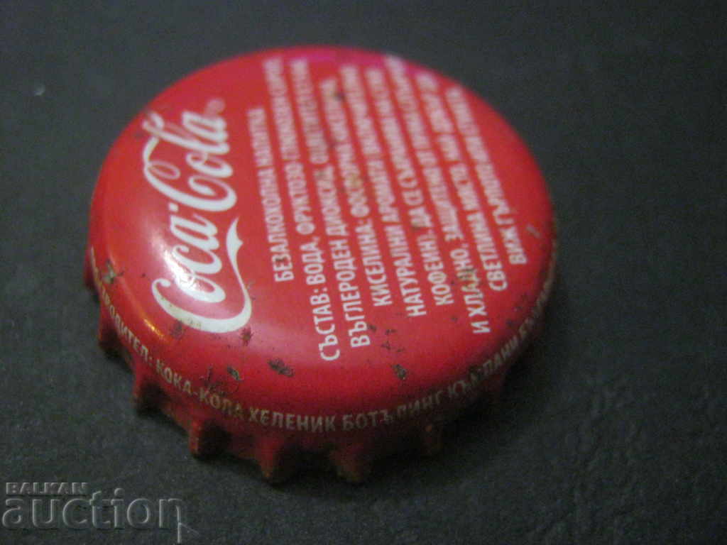 Caps. Soft drinks. Coke with price 0.65 BGN | € 0.33 Caps. Soft drinks. Coke with price 0.65 BGN | € 0.33