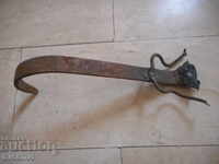 Old forged handle made of copper pan