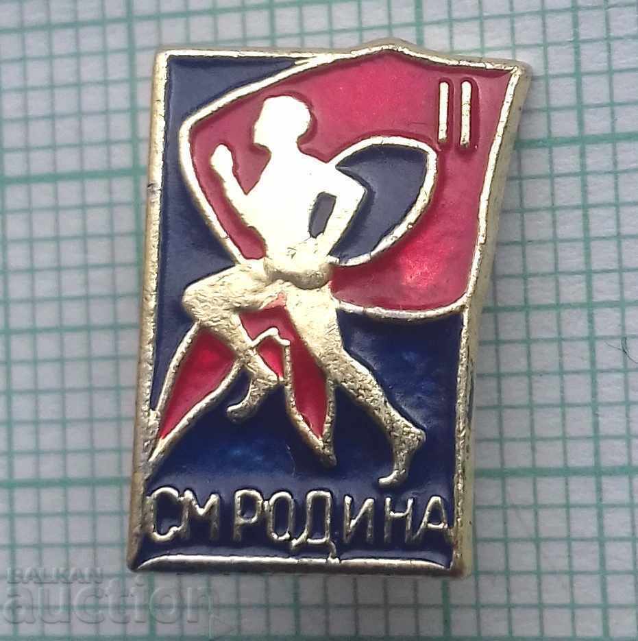 6070 Badge - CM Rodina