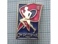 6070 Badge - CM Rodina