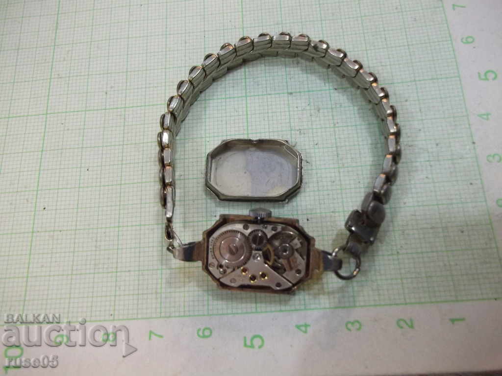 Auction Clock "Exacto" with ladies handmade Swiss handmade Auction Clock "Exacto" with ladies handmade Swiss handmade