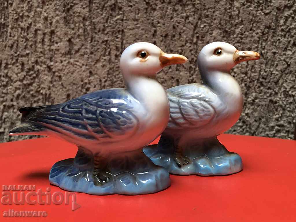 Auction Lot of porcelain figures pair of glaruses Auction Lot of porcelain figures pair of glaruses