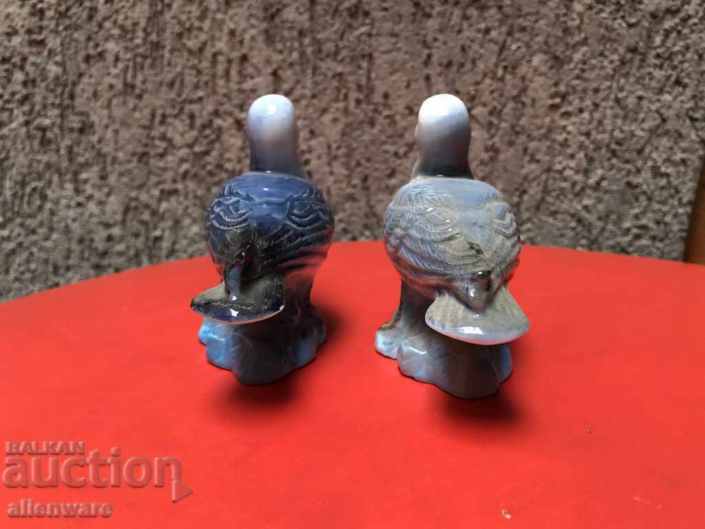 Delivery of Lot of porcelain figures pair of glaruses Delivery of Lot of porcelain figures pair of glaruses