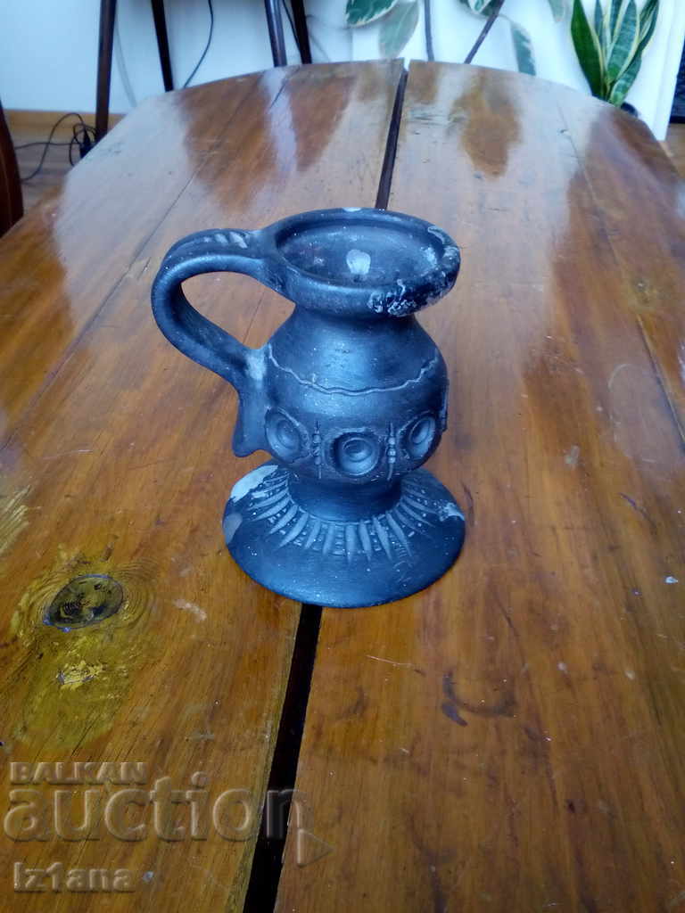 Auction  Ceramic candlestick