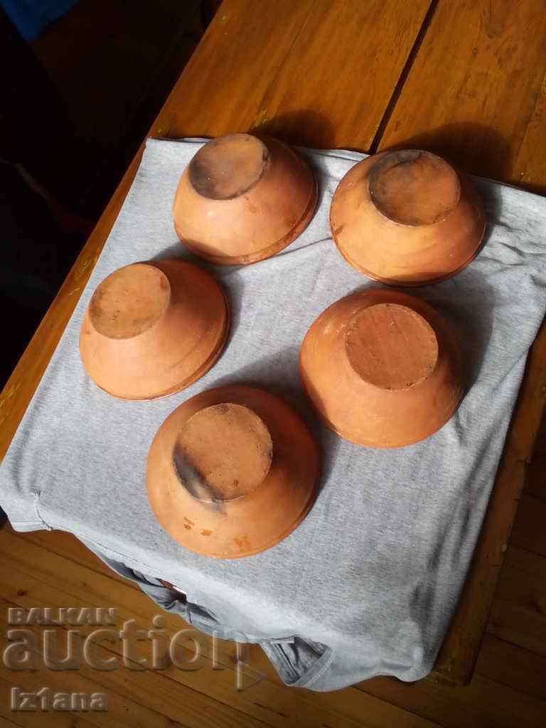 Auction An old clay pigeon, a vest Auction An old clay pigeon, a vest