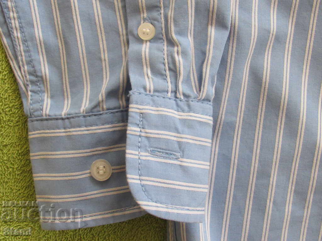 Delivery of Blue long-sleeved shirt for a boy H&M size 122 Delivery of Blue long-sleeved shirt for a boy H&M size 122