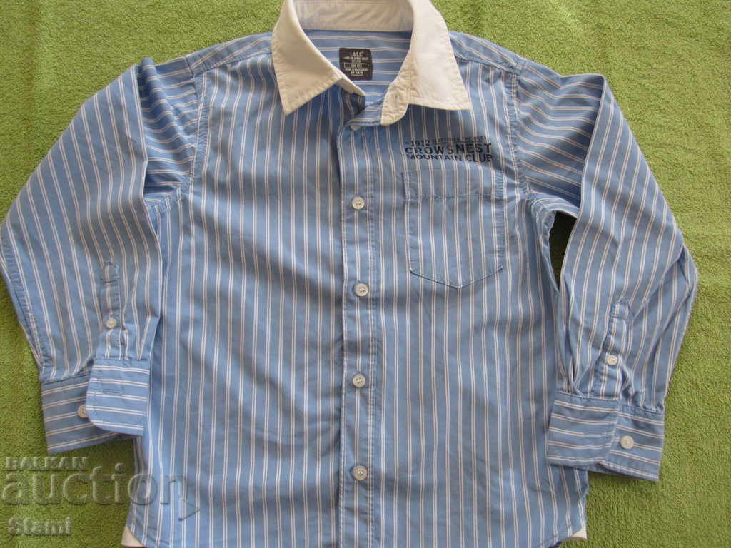 Blue long-sleeved shirt for a boy H&M size 122 - 6 Blue long-sleeved shirt for a boy H&M size 122 - 6